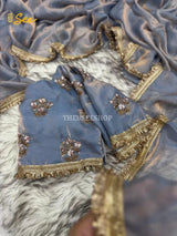 vGrey Shimmery Tissue Saree With Pretty Lace Work